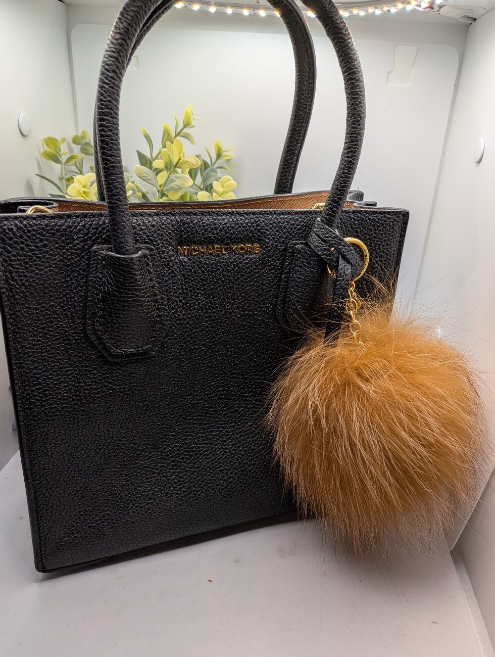 MICHAEL KORS Mini Black Leather Tote with Brown MK Fur Pom Charm